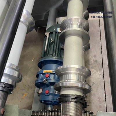 Compact double layer roll forming machine producing two trapezoidal roof sheet profiles efficiently.