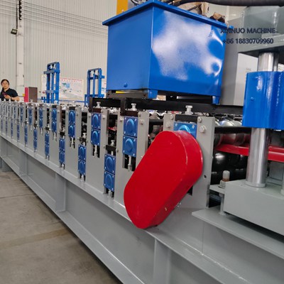 Dual-layer roll forming machine for trapezoidal and glazed tile profiles, space-saving design.