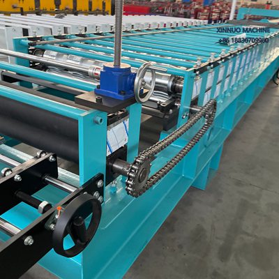High-speed iron roof sheet roll forming machine with servo motor and chain drive for precise production.
