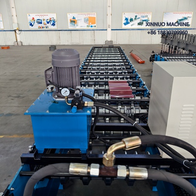 Efficient trapezoidal panel roll forming machine for producing precise metal roof and wall panels.