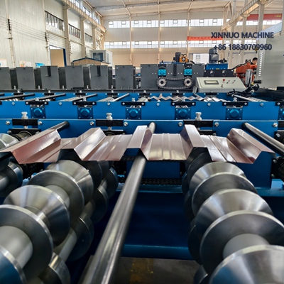 Efficient trapezoidal panel roll forming machine for producing precise metal roof and wall panels.