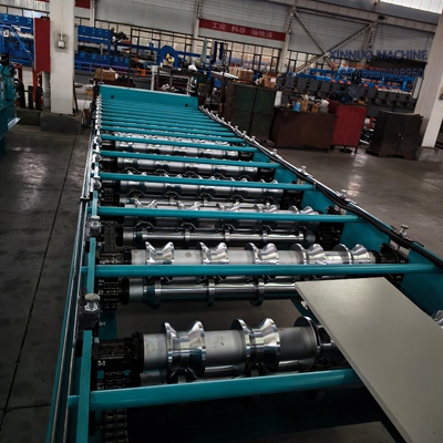 High-speed trapezoidal roof sheet roll forming machine for durable and precise metal roofing.
