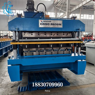 double layer roofing sheet machine - hydraulic cutting system front view with finished panels