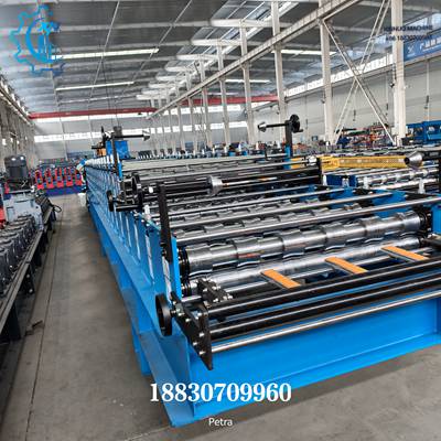 double layer roofing sheet machine - side view of feeding section with roller system and film laminating device