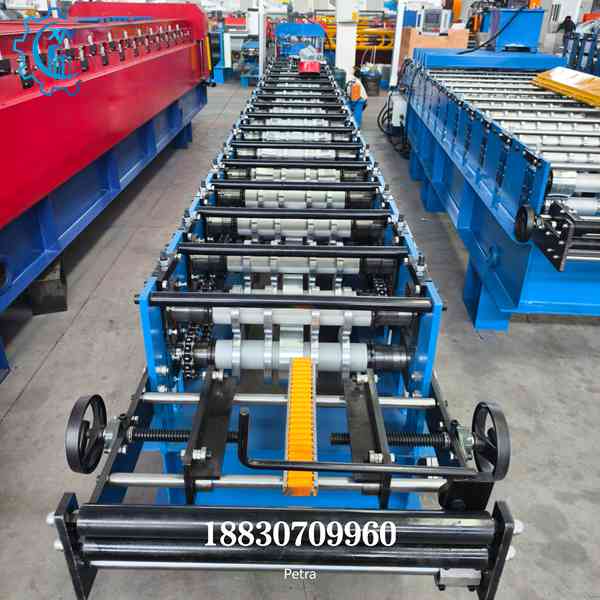 Top angle view of the feeding entry on the ridge cap roll forming machine