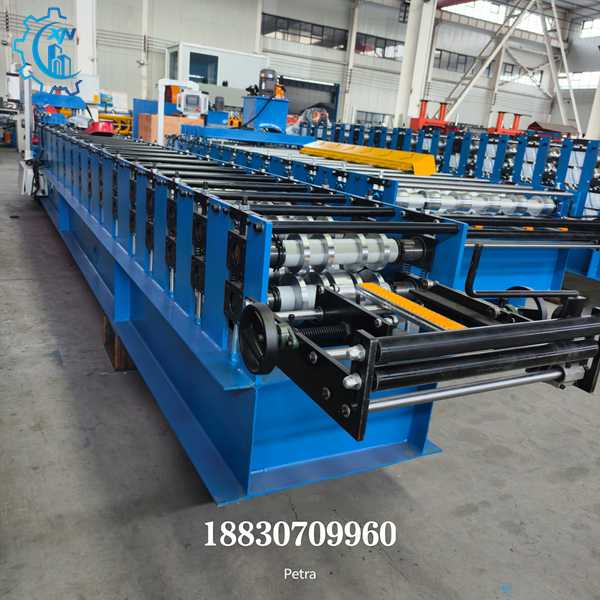 Side view of material feeding section of ridge cap roll forming machine