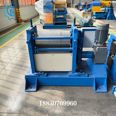 Embossing machine for metal
